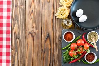 Empty Frying Pan with Fresh Vegetables On Wooden Table, Ready For Cooking