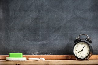 Chalks And Blackboard With Alarm Clock, Education And Time